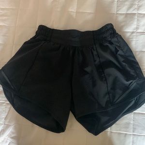 Black Lululemon 4 inch hottie hot shorts in size 2